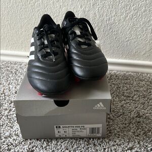 Adidas Black Cleats with Red Bottoms